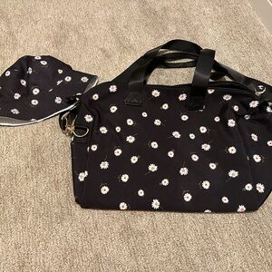Alice and Olivia daisy duffle and bucket hat